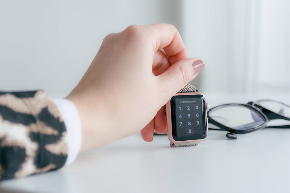 Rose Gold Smartwatch on White Surface