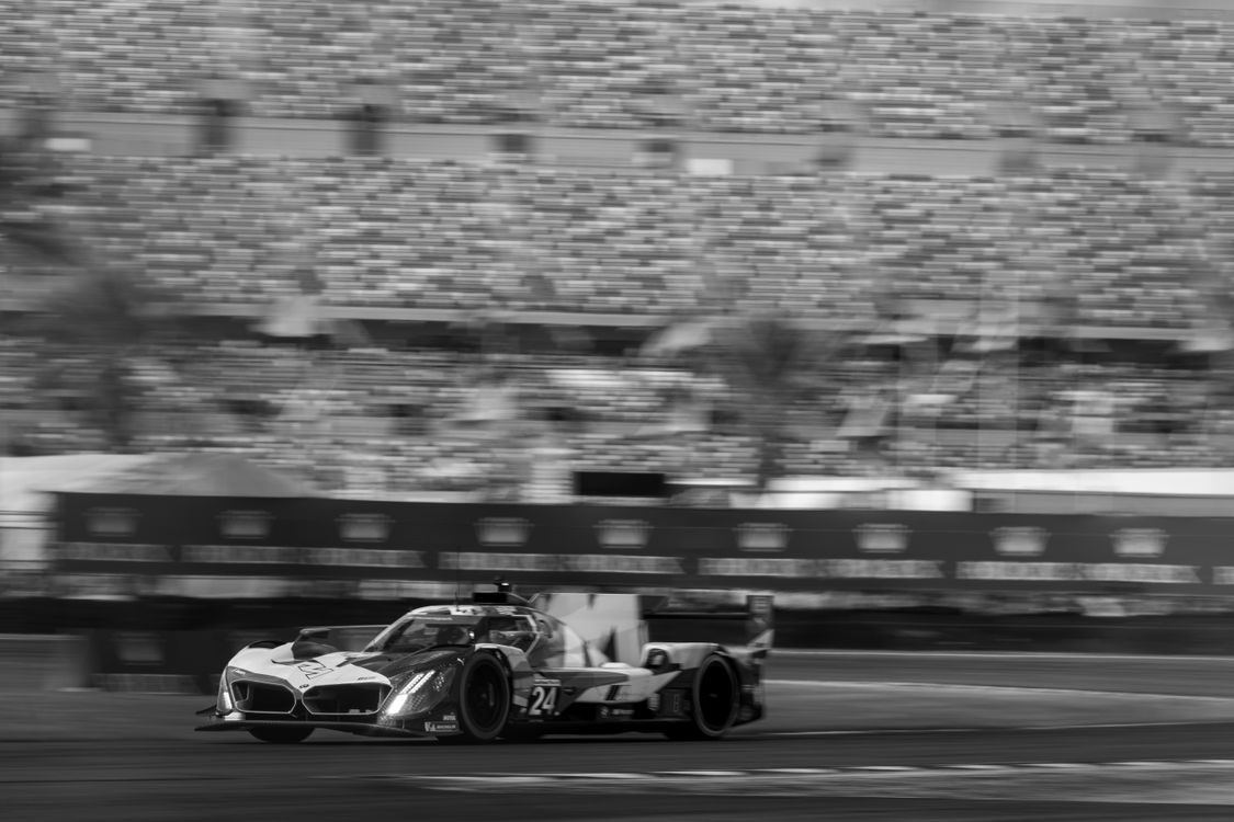Black and White Photography of a Racing Car · Free Stock Photo