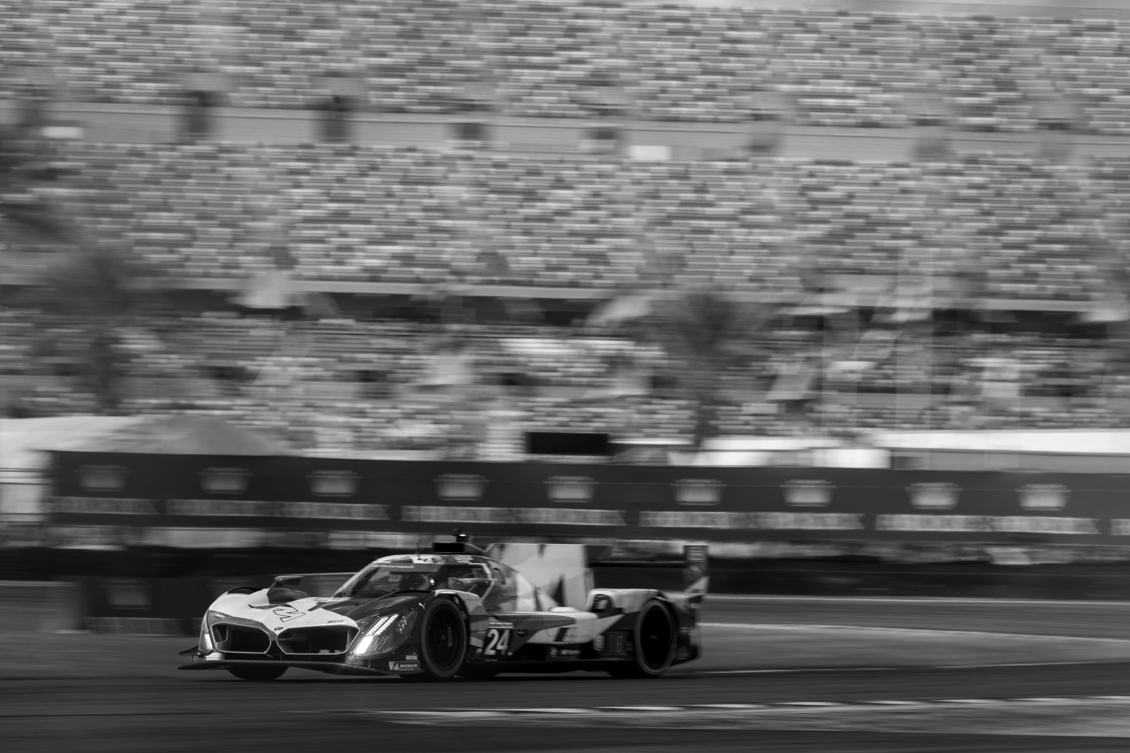 Black and White Photography of a Racing Car · Free Stock Photo