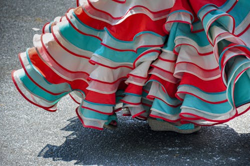 Bottom part of a flamenco dress in bright red, blue en white colors