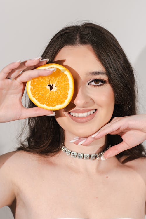 Безкоштовне стокове фото на тему «апельсин, велика усмішка, великі очі»