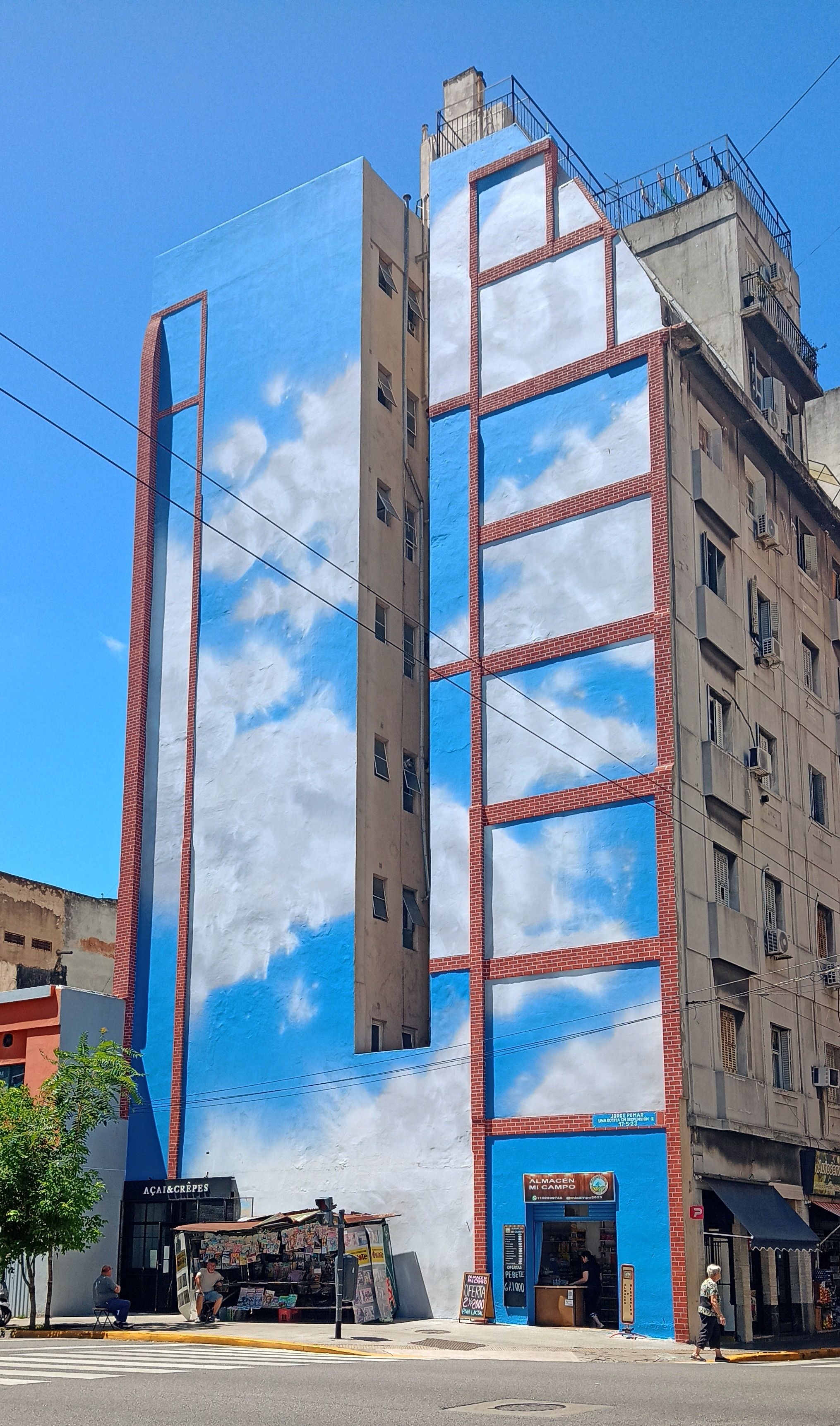 Colorful street art mural on a city building in Buenos Aires, Argentina.