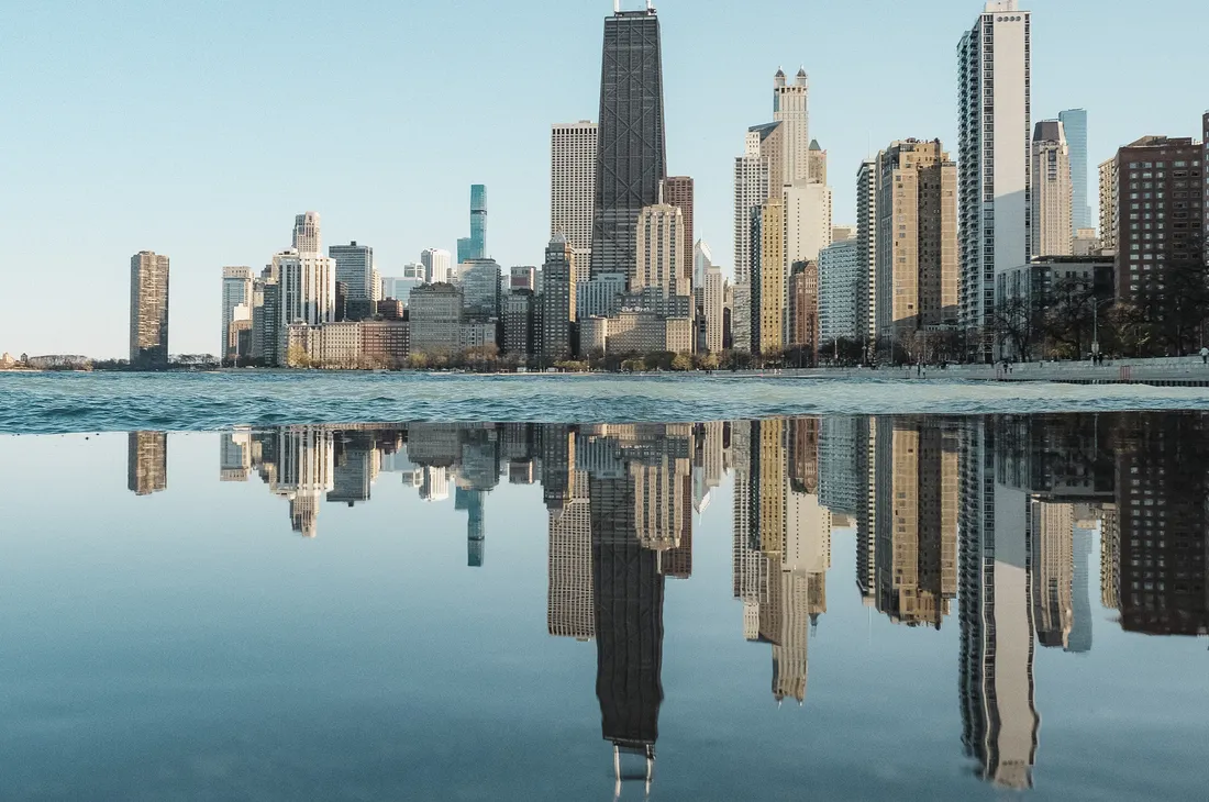 The 10 Best Places to Stay in Chicago (For Every Budget) 8 Skyscrapers reflected in the Chicago River near The Langham hotel on Wabash Avenue