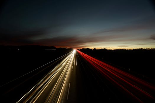 Captivating long exposure shot of highway lights during twilight in Germany.