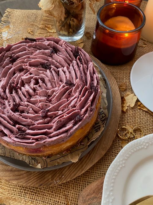 Free Rustic berry cake with candles and fall decorations on a burlap surface. Stock Photo