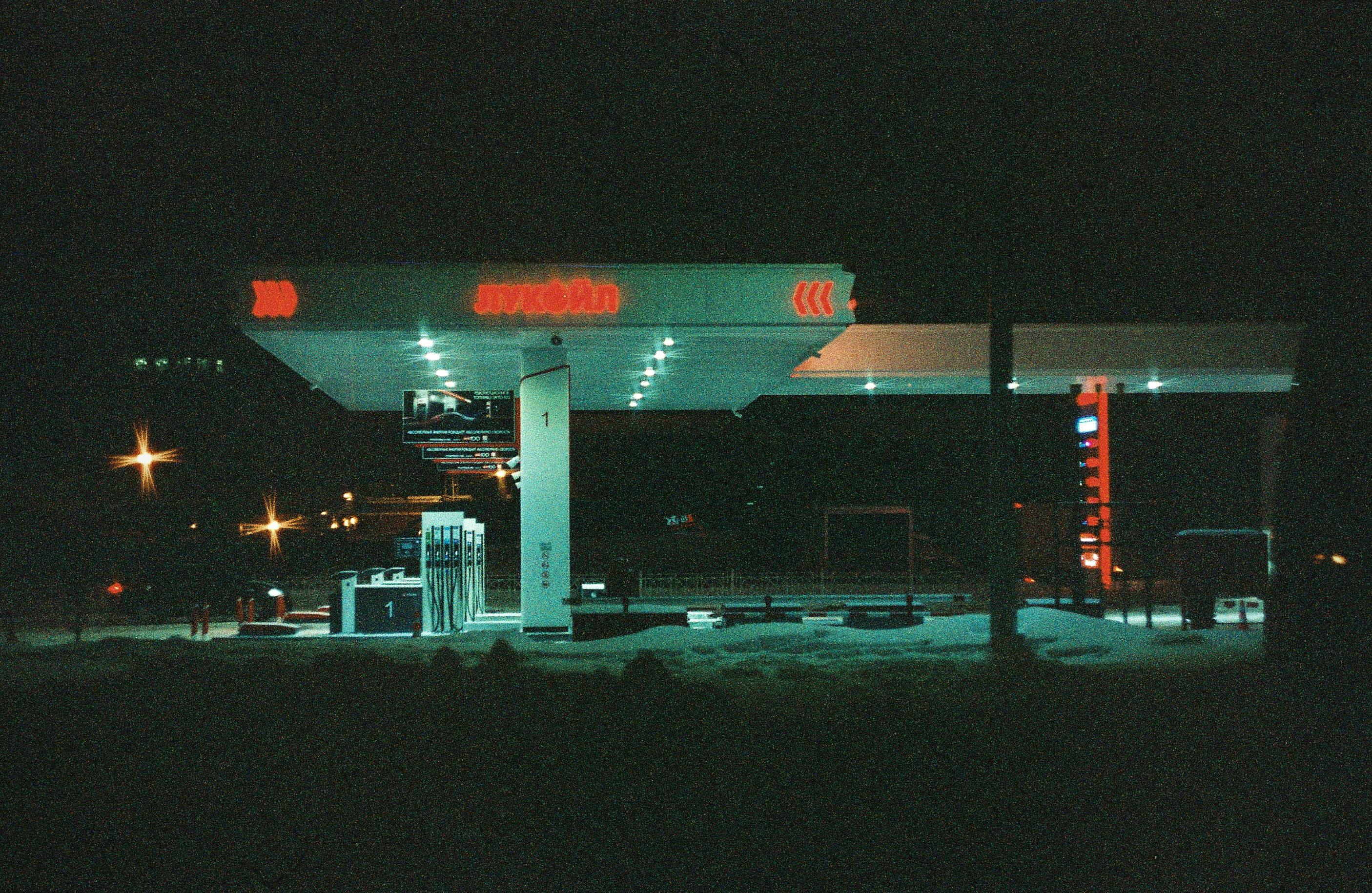 Royalty-Free photo: Three orange gas stations