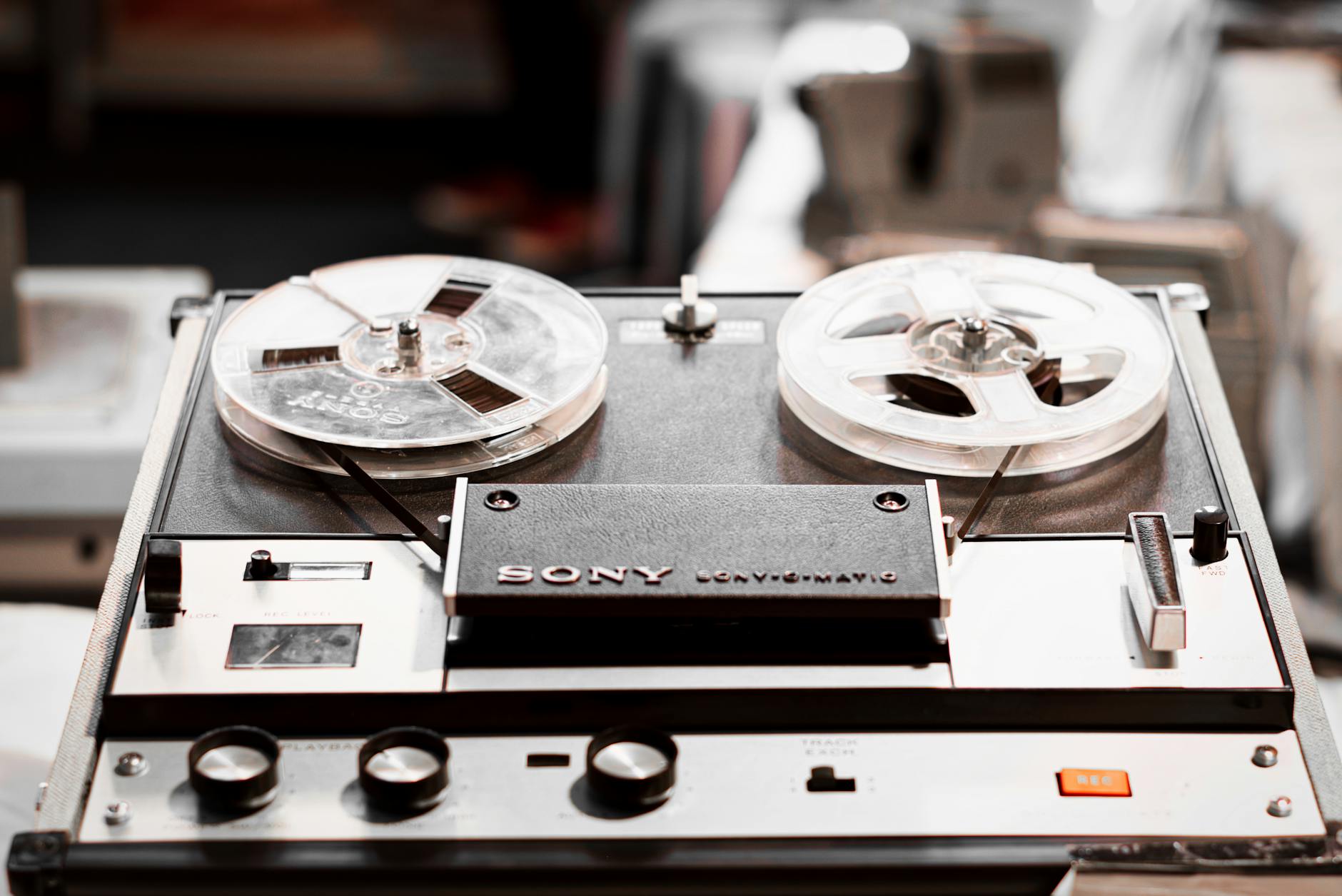 Close-up of a vintage Sony reel-to-reel tape recorder, highlighting classic audi
