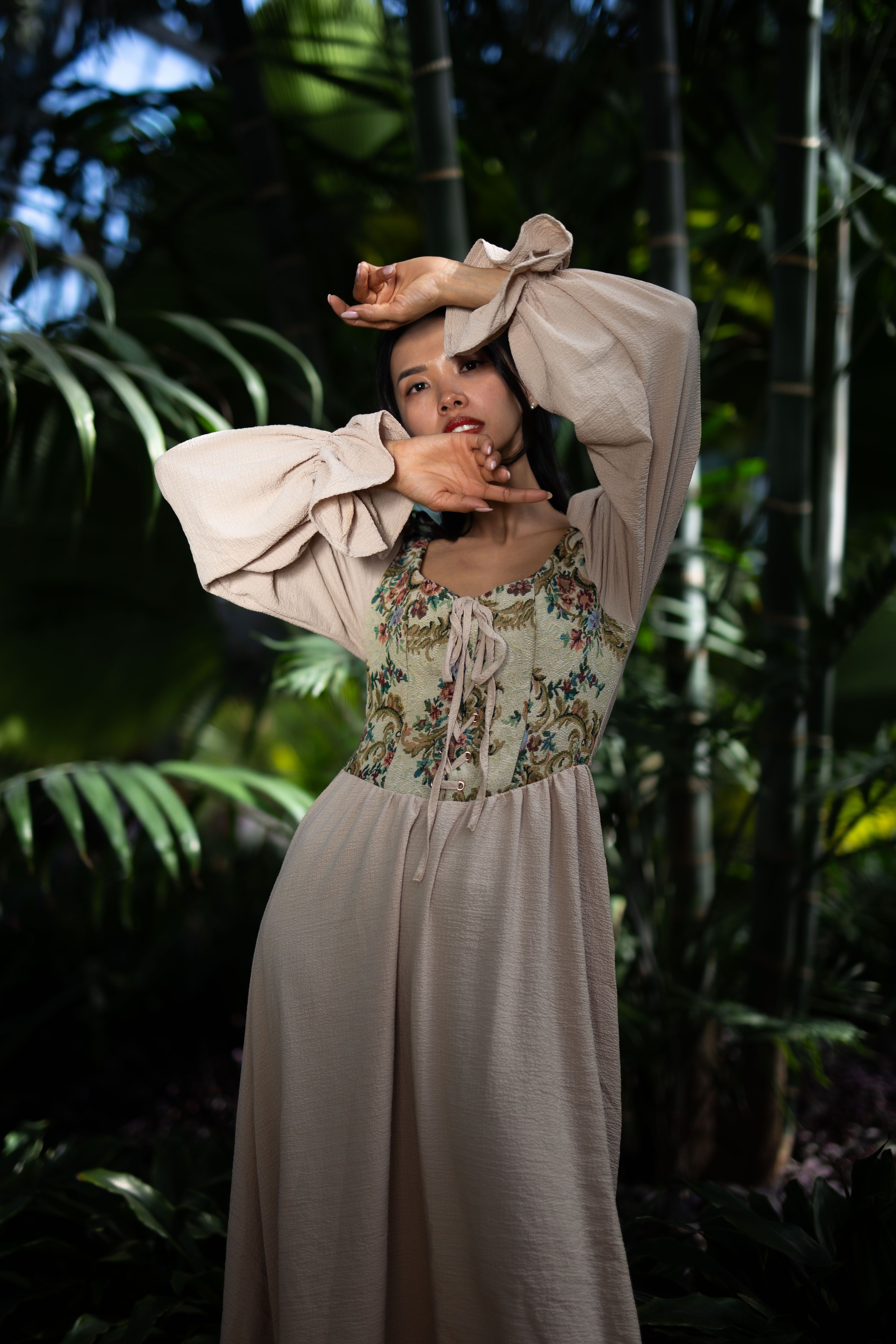Woman Posing in a White Dress Among Plants · Free Stock Photo