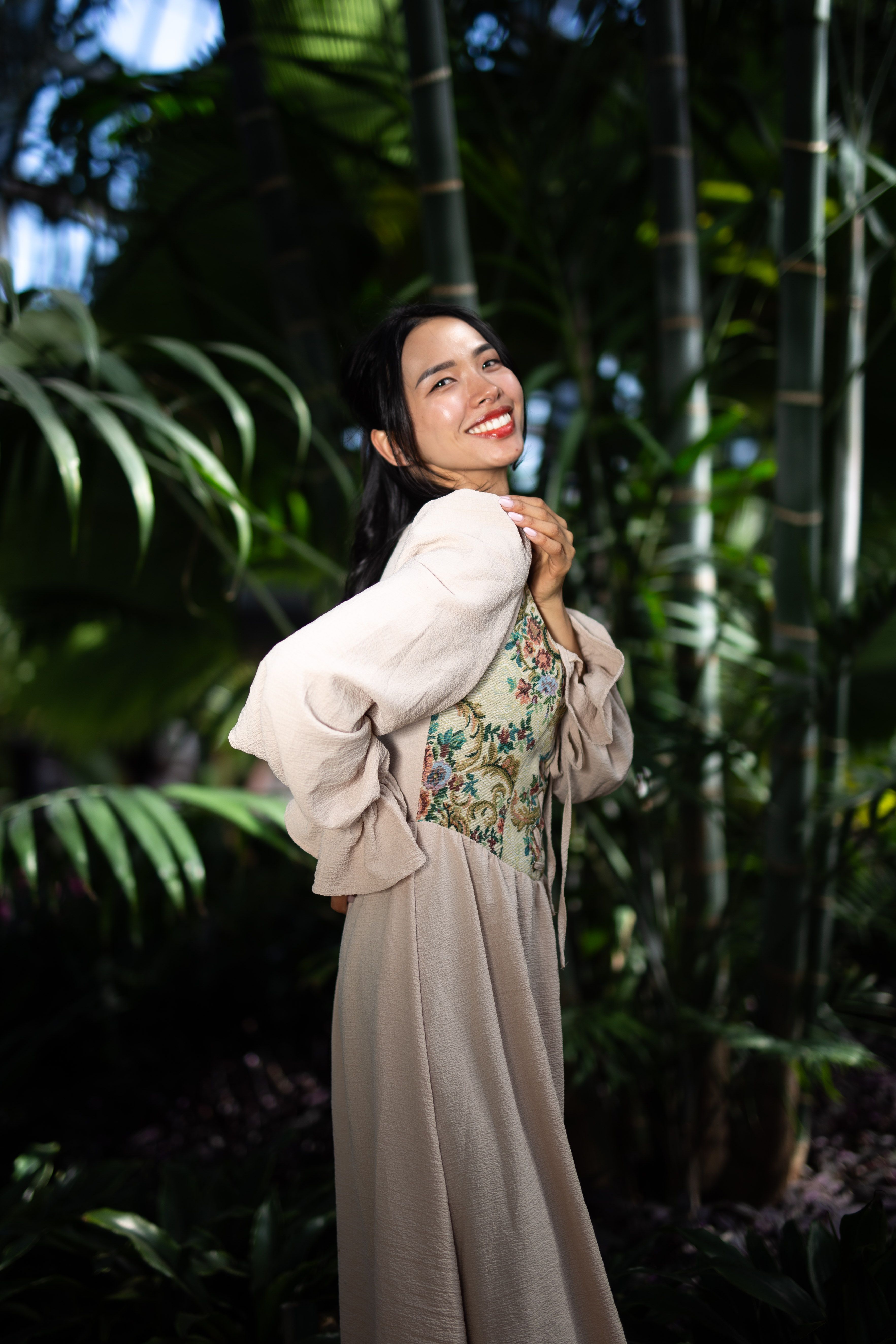 Woman Posing in a White Dress Among Plants · Free Stock Photo