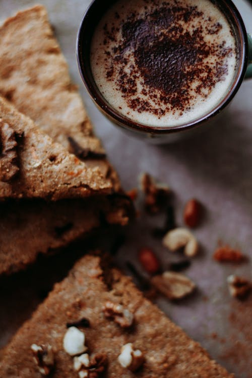 Free Baked Pastry Beside Ceramic Mug Stock Photo