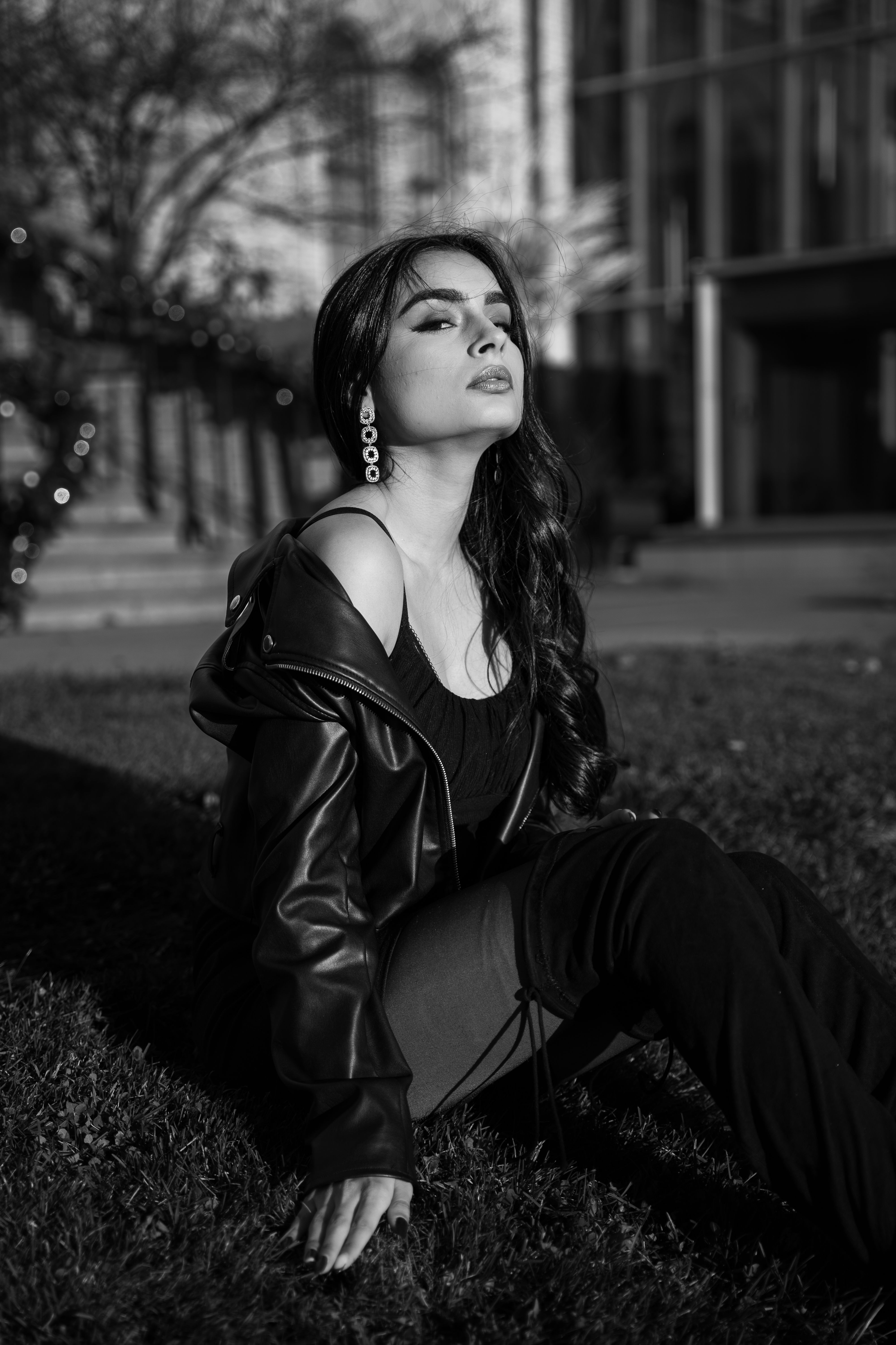 Woman in leather jacket and camisole