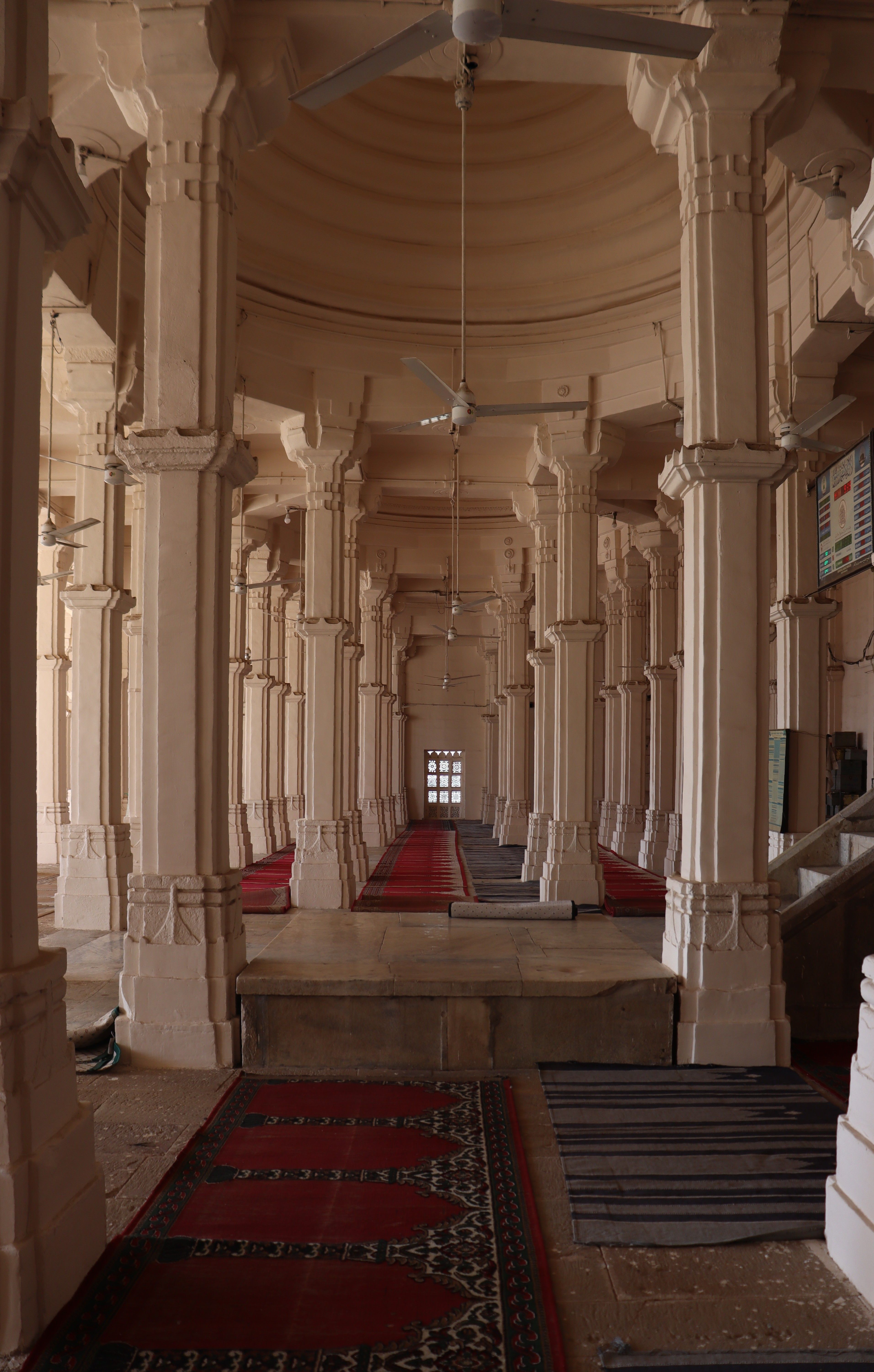 Explore the serene corridors and magnificent architecture of Sarkhej Roza Mosque in Ahmedabad, India. | Indian Village Development