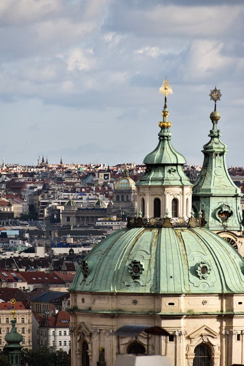 A view of the city with a church and a clock tower