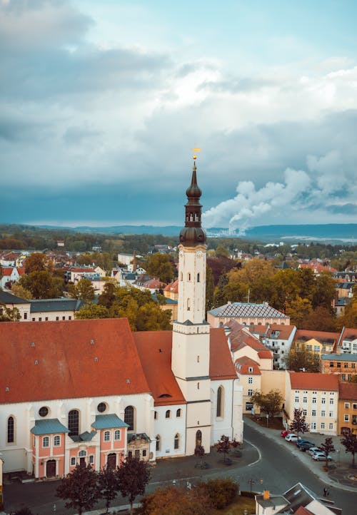 The cover of a book with a church in the background