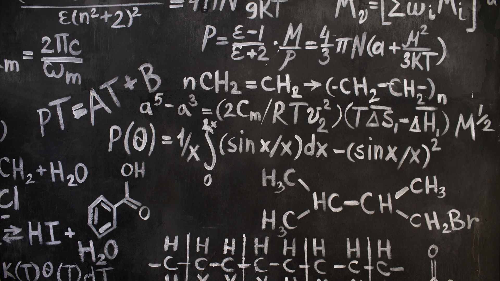 Mathematical equations on a blackboard