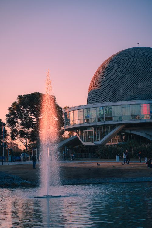 Free Stunning view of the Galileo Galilei Planetarium with fountain at dusk in Buenos Aires. Stock Photo