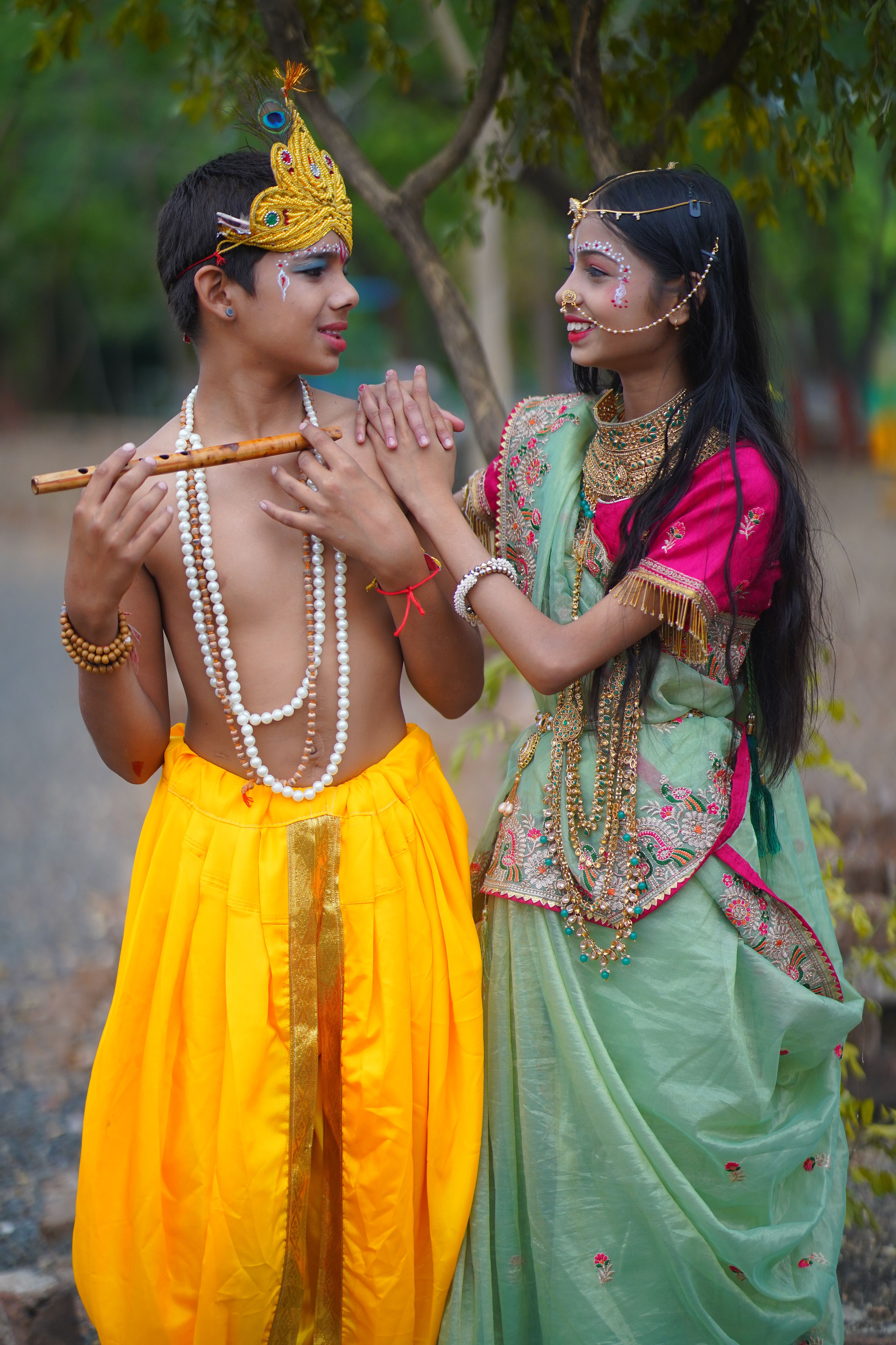 A beautiful portrait of teenagers dressed in traditional Indian attire, depicting cultural heritage.