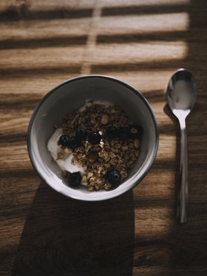 Still from the method clip: oats and yoghurt spooned into a bowl — photo by Lisa from Pexels