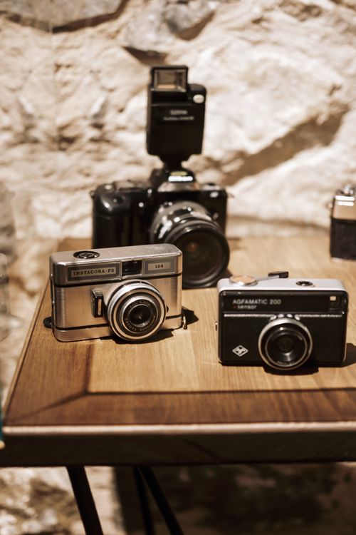 Vintage Cameras on the Table · Free Stock Photo