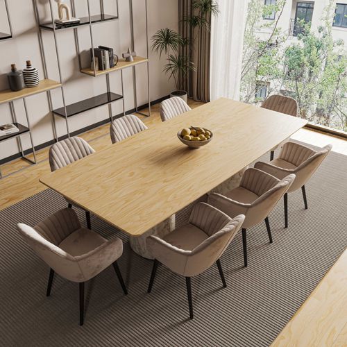 Free Contemporary dining room in London with a minimalist design featuring a large table and light tones. Stock Photo