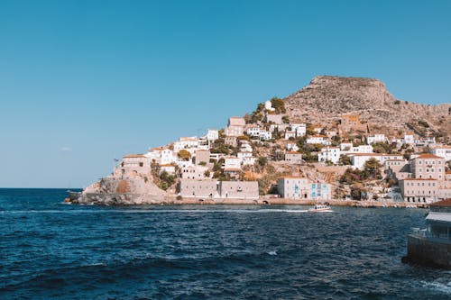 The island of greece with a small town on it
