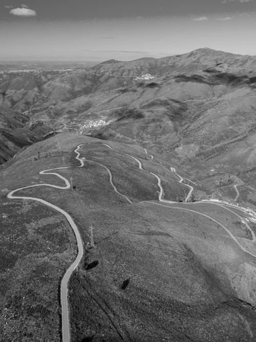 Black and white photo of a winding road