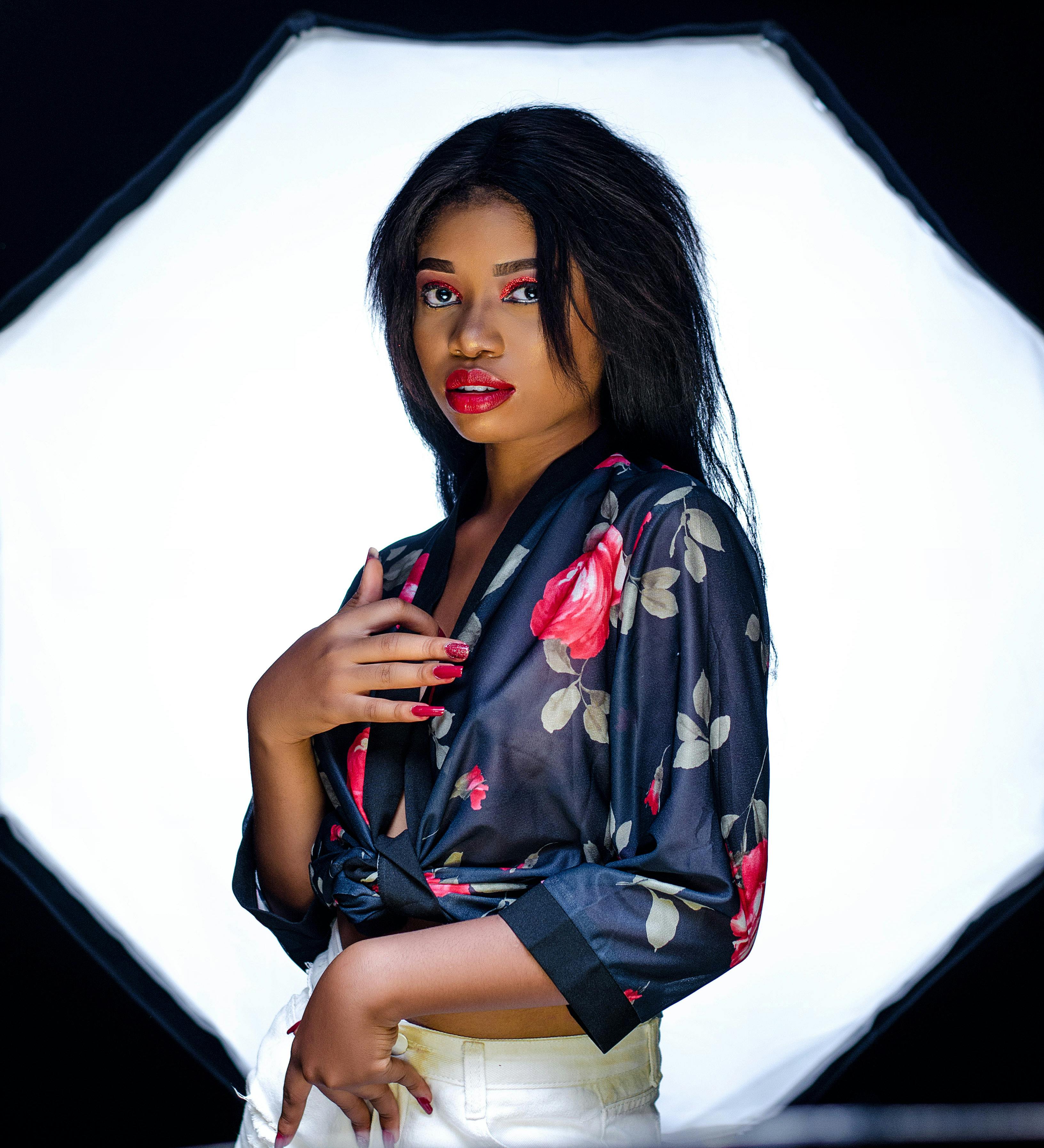 woman wearing floral silk top