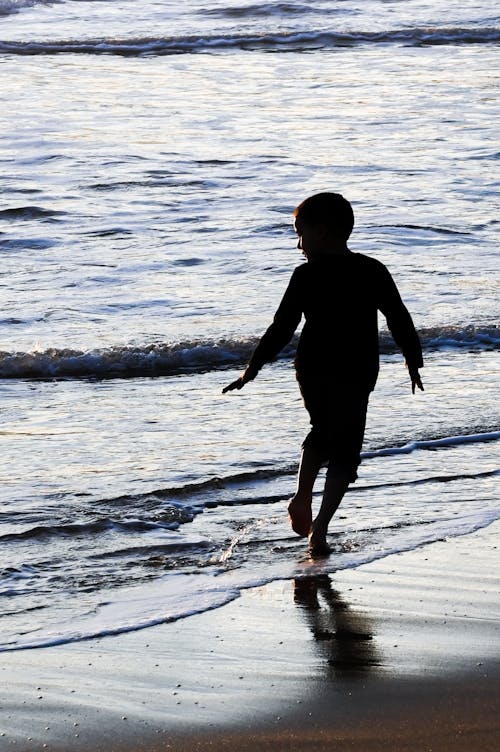 Free stock photo of back, beach, kid