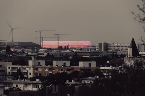 A pink building is in the distance