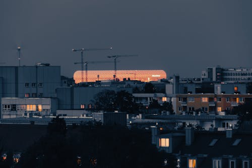 A city skyline with a building in the background