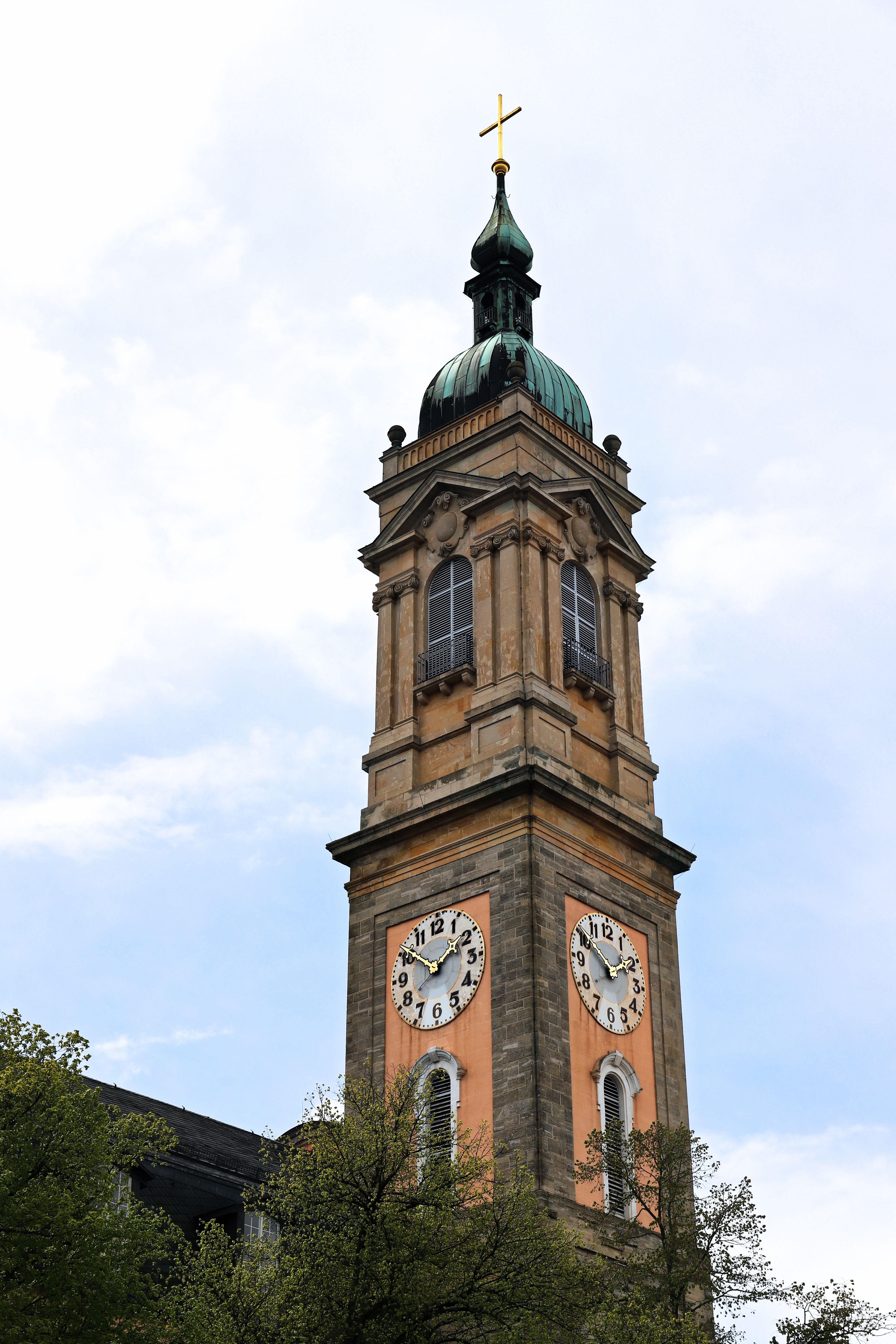 St. George's church tower in Eisenach, showcasing gothic architecture and historic charm.