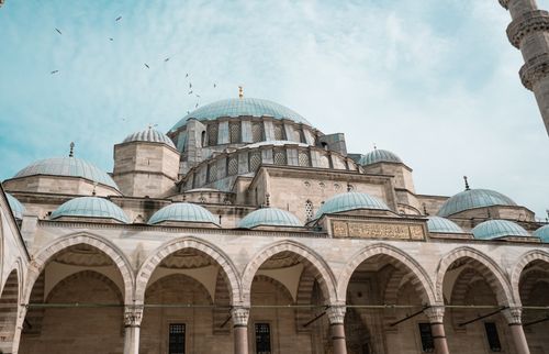 Free Stunning view of Suleymaniye Mosque showcasing Ottoman architecture with detailed domes and arches. Stock Photo
