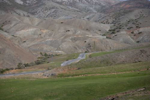 Free Serene landscape with winding road through mountainous terrain in Kayaönü, Elazığ, Türkiye. Stock Photo
