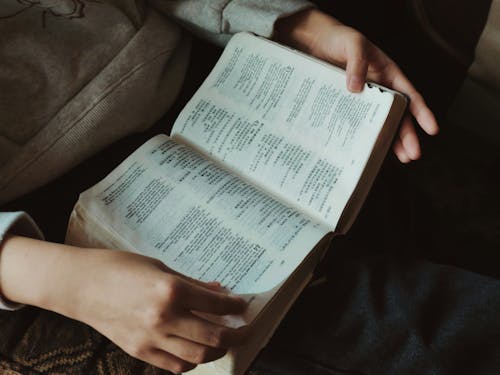 Hands Holding Book