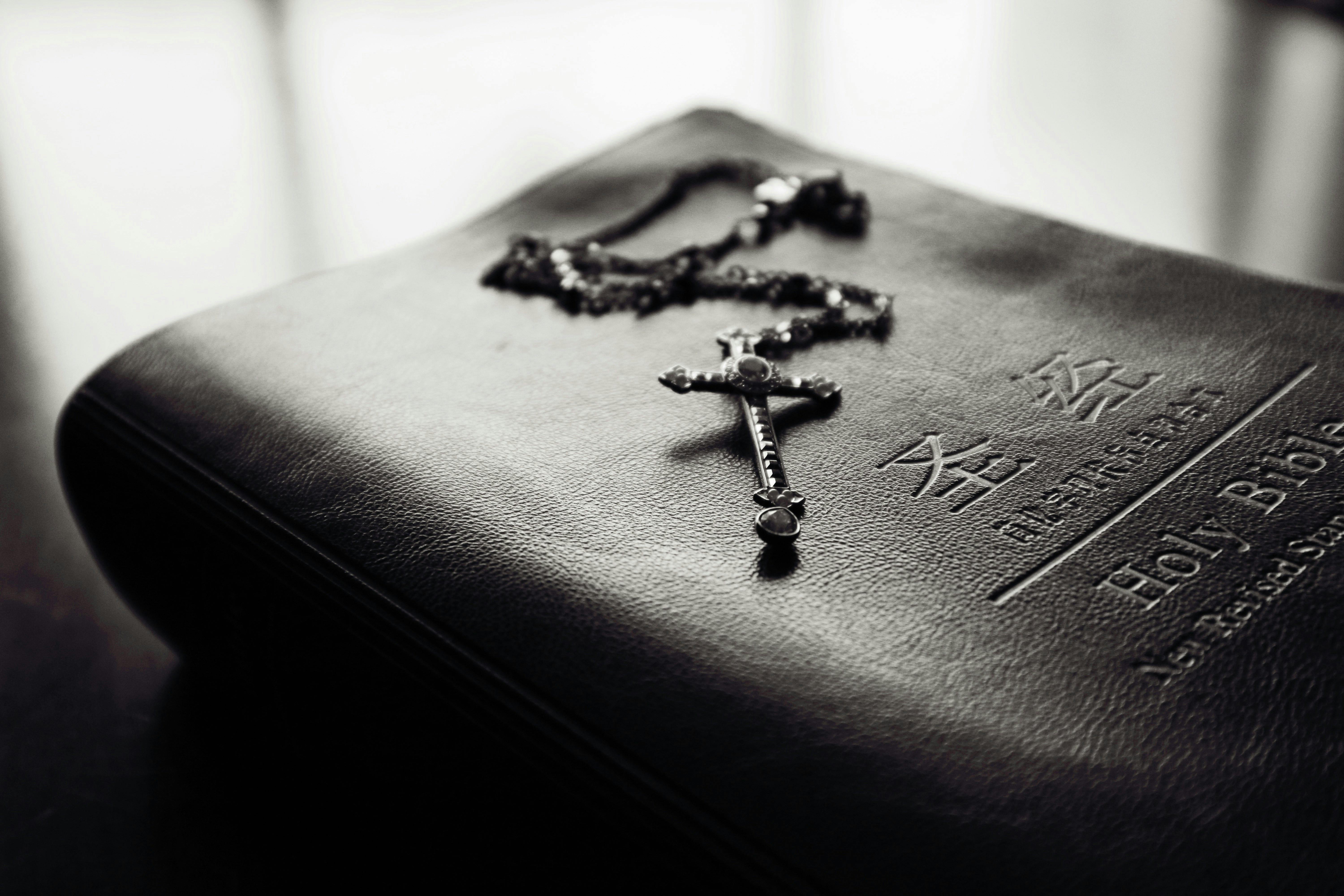 Rosary with Cross on Bible Cover · Free Stock Photo