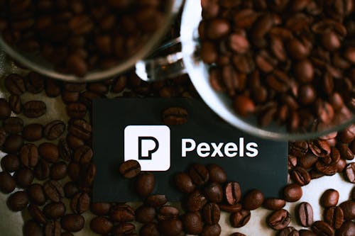 Peeks logo on top of coffee beans