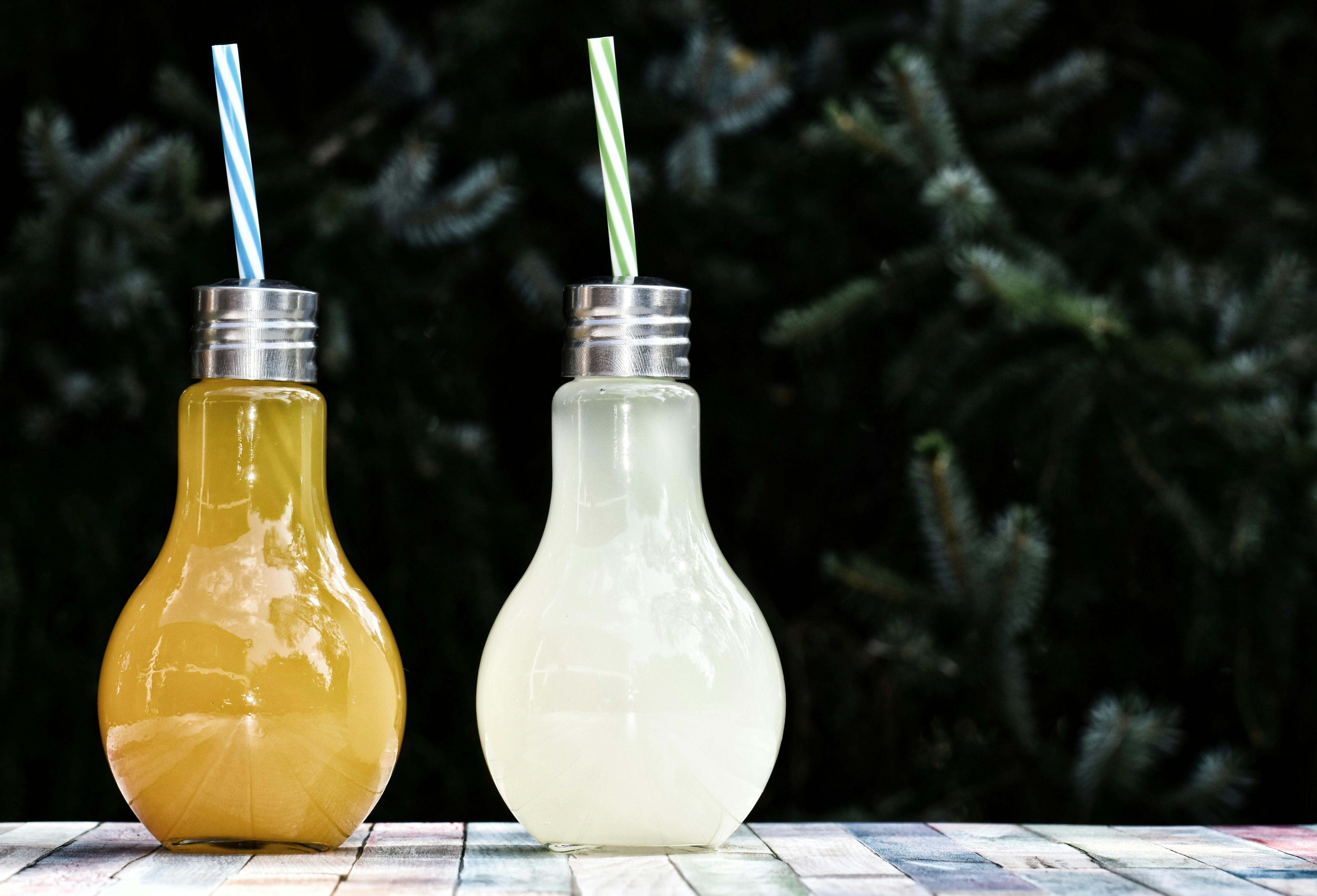 Clear Glass Juice Containers · Free Stock Photo