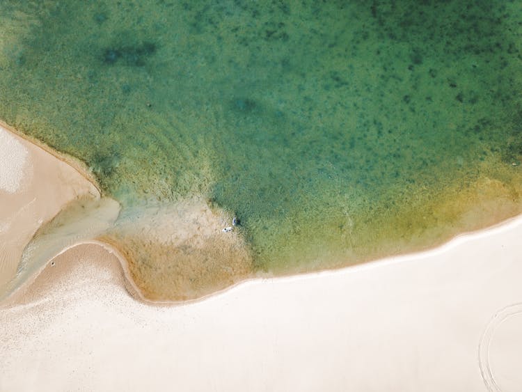 Aerial Photography Of Waves Crashing Shore