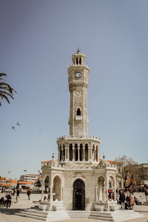 Free A stunning view of the iconic İzmir Clock Tower in sunny Konak Square, showcasing Ottoman architecture. Stock Photo