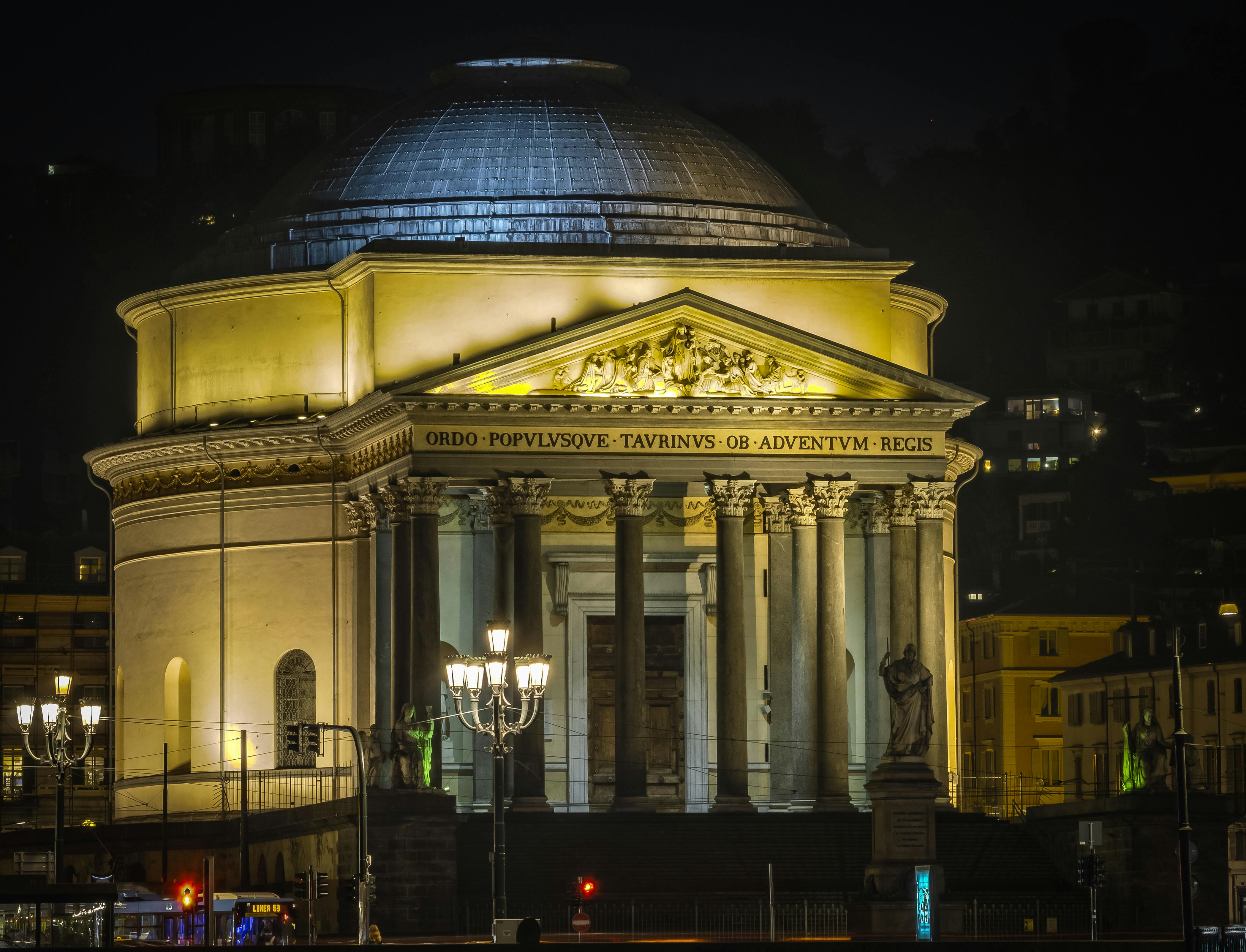 facade of illuminated the gran madre di dio church in turin italy