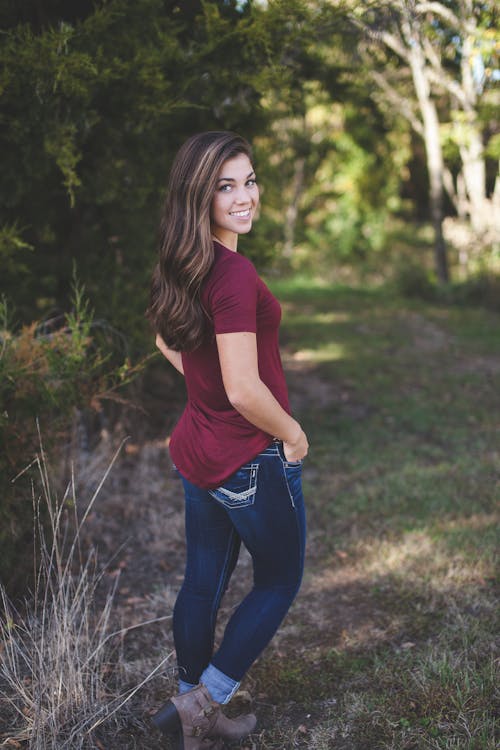 Free Woman Standing Near Trees Stock Photo