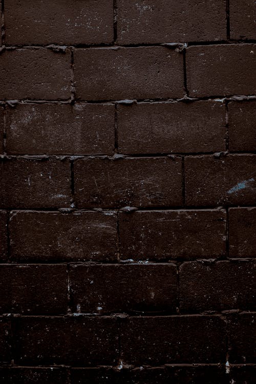 無料 茶色のコンクリート壁レンガ 写真素材