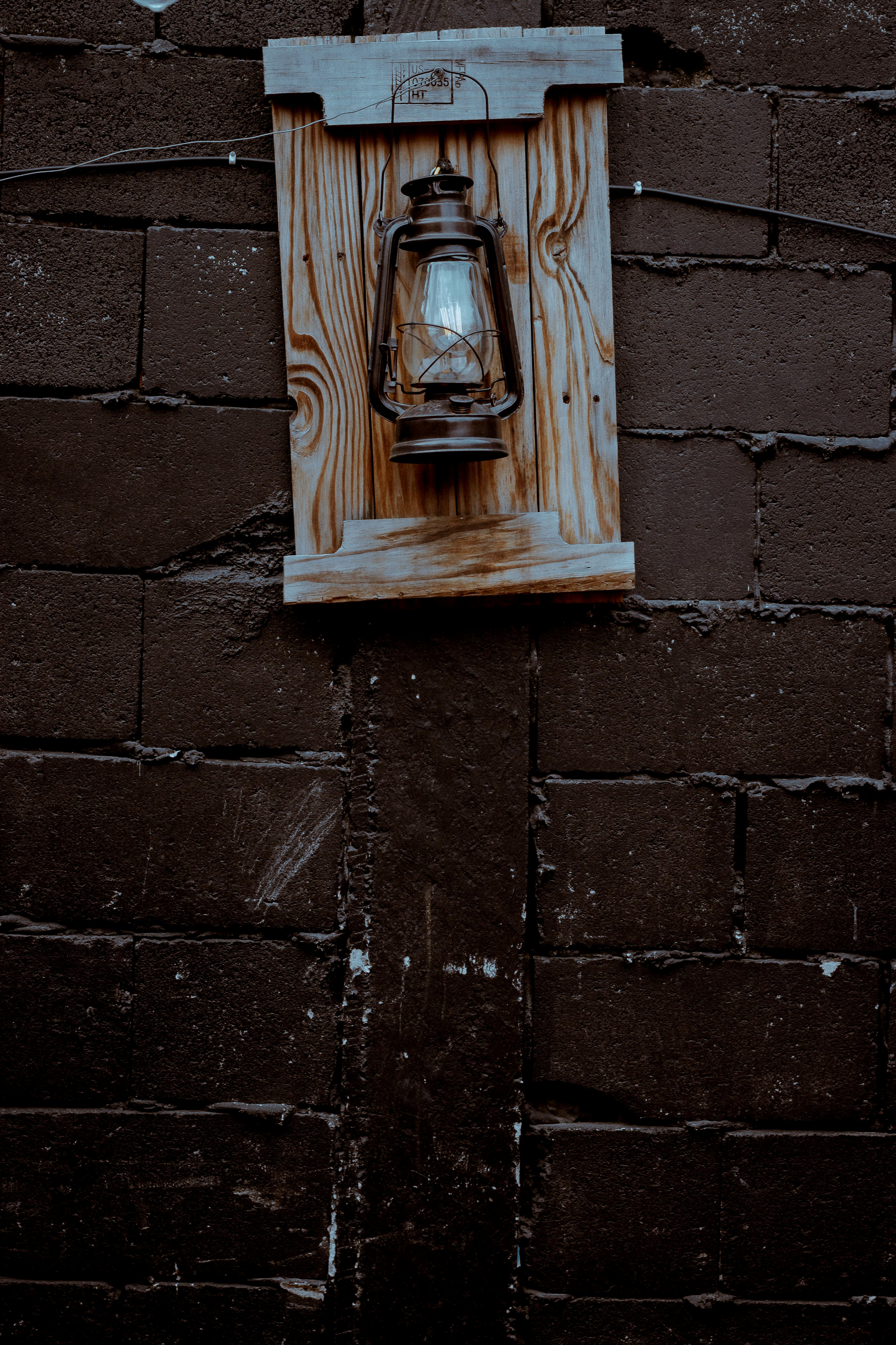 Kerosene Lamp Hanging on Wall · Free Stock Photo
