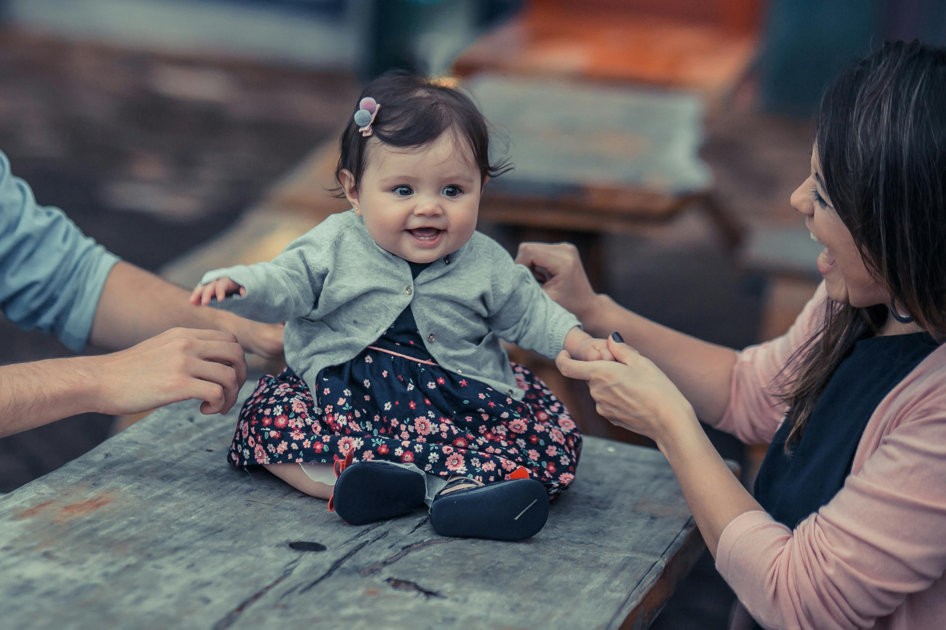 Toddler Sitting on Table