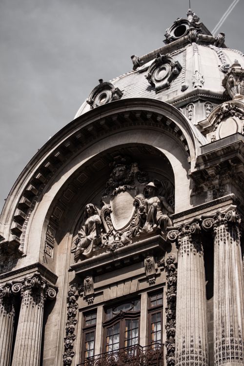 Free A detailed view of the ornate facade of a historical building in Bucharest, Romania. Stock Photo