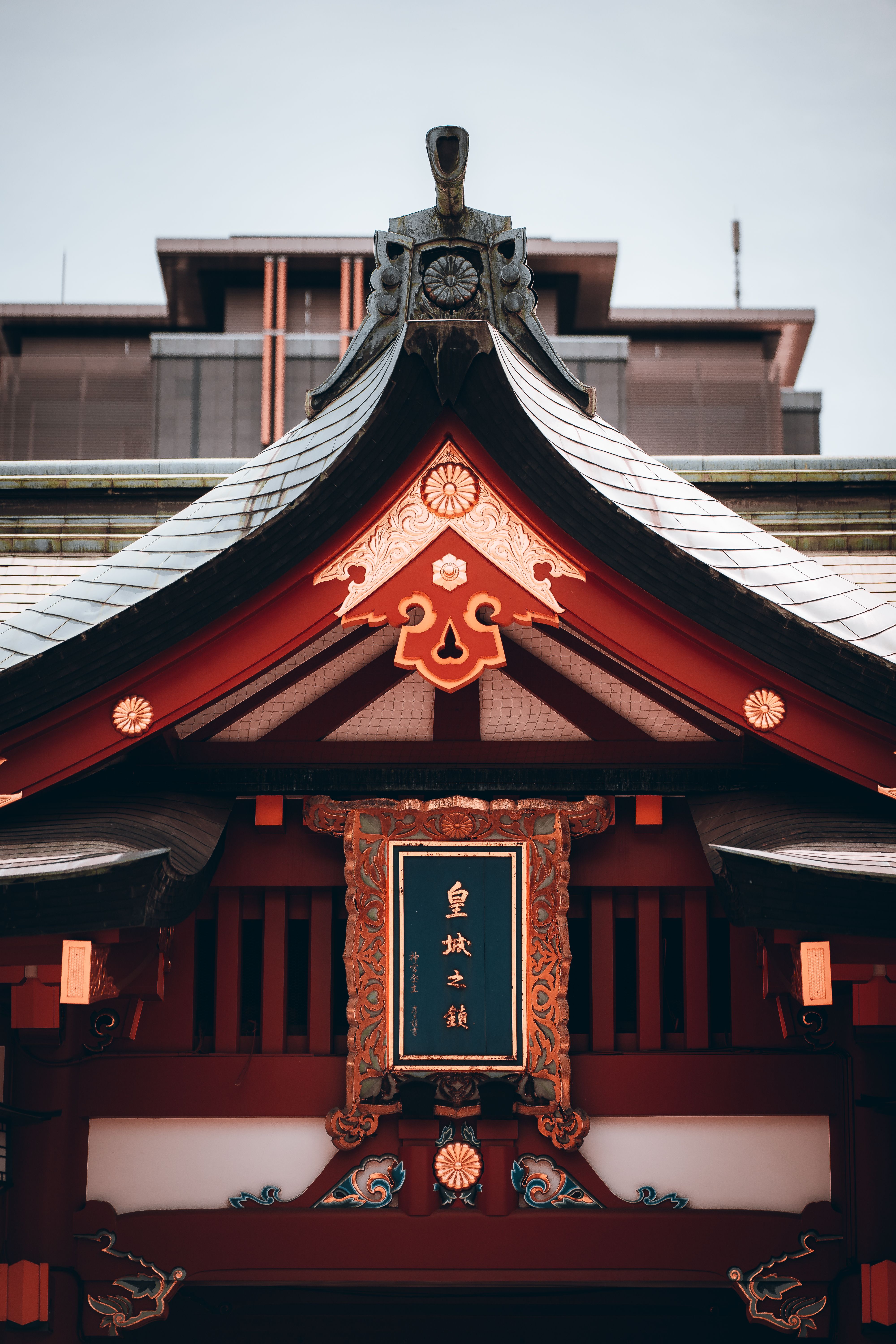 Elegant rooftop of a Shinto shrine in Tokyo symbolizing traditional architecture.