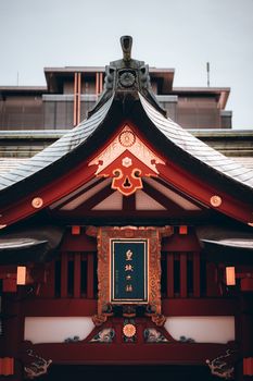 Elegant rooftop of a Shinto shrine in Tokyo symbolizing traditional architecture.