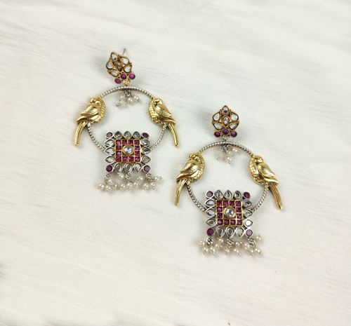 Free peacock design  earrings    Stock Photo