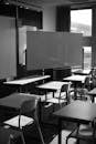 Black and White Photo of an Empty Classroom