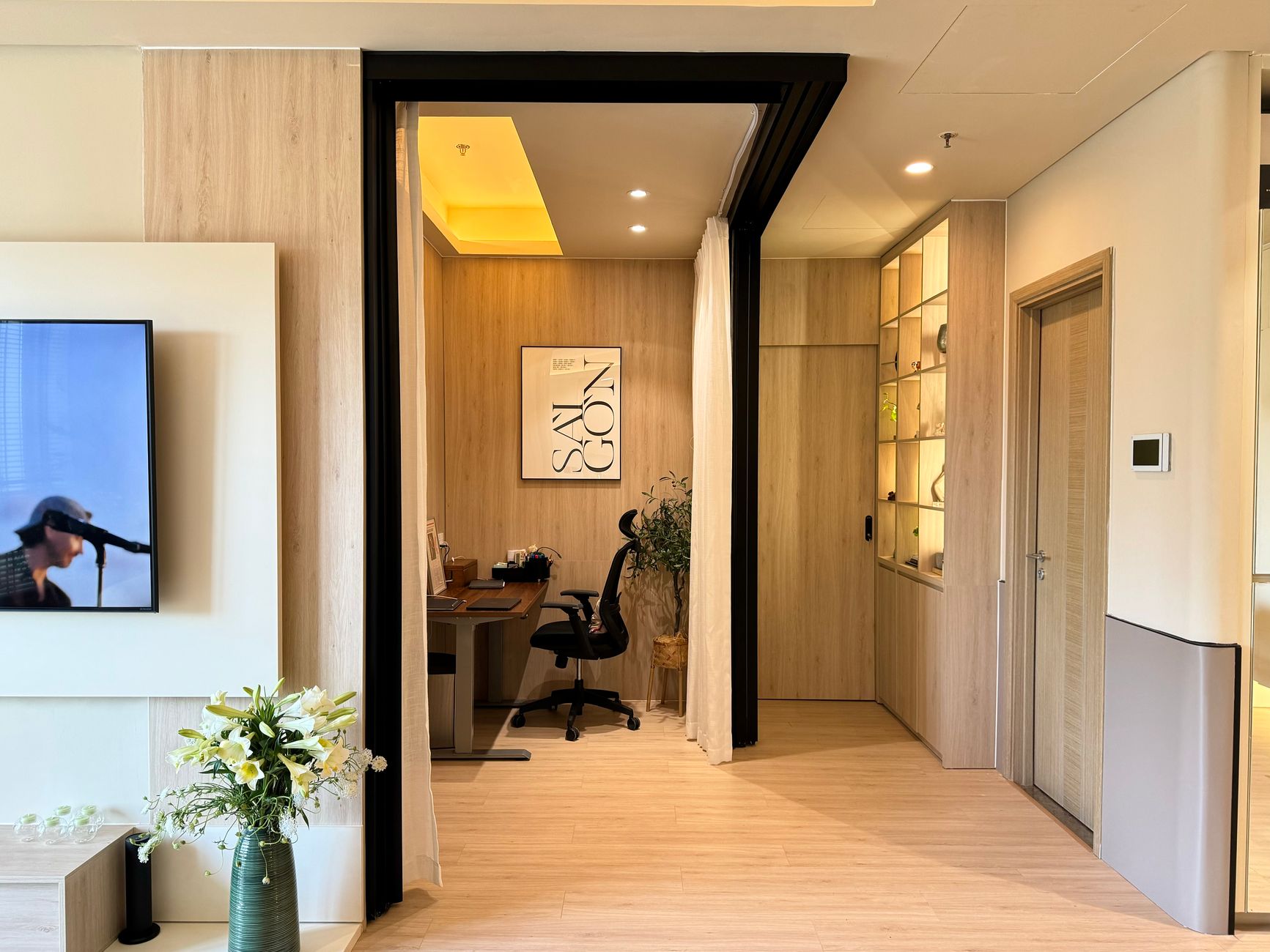 Stylish home office featuring sleek furniture and contemporary interior design with natural light.